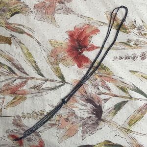 Anthropologie midnight blue beaded knot necklace